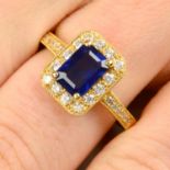 An 18ct gold sapphire and diamond cluster ring.