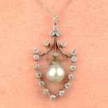 A pearl and diamond pendant.