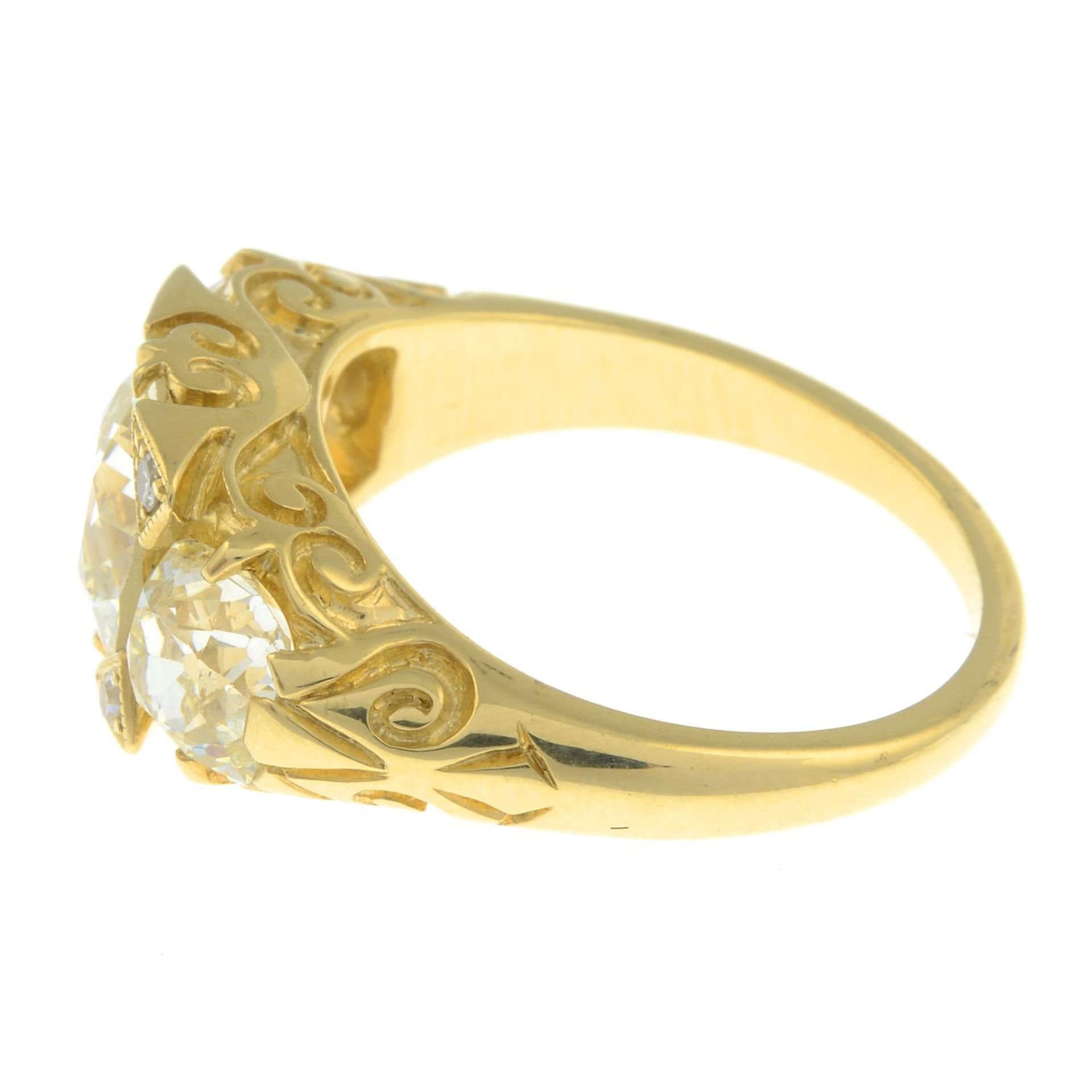 A graduated old-cut diamond three-stone ring, with single-cut diamond accents. - Image 6 of 7