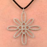 A pavé-set diamond pendant,