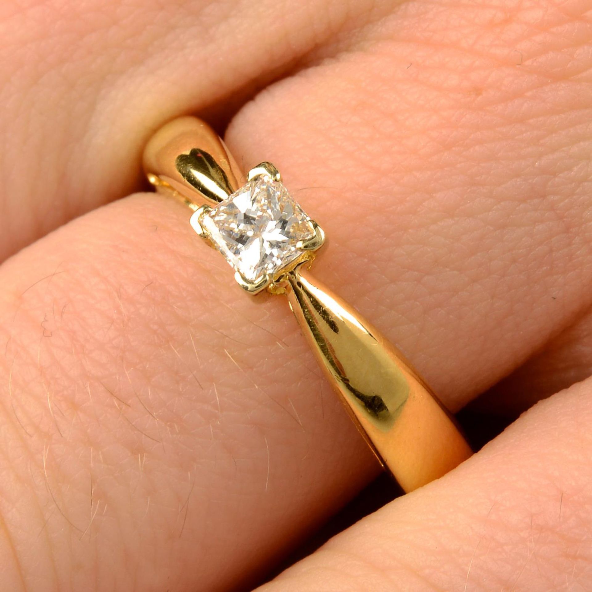 An 18ct gold square-shape diamond single-stone ring,