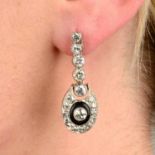 A pair of old-cut diamond and onyx earrings.Estimated total diamond weight 1.75cts,