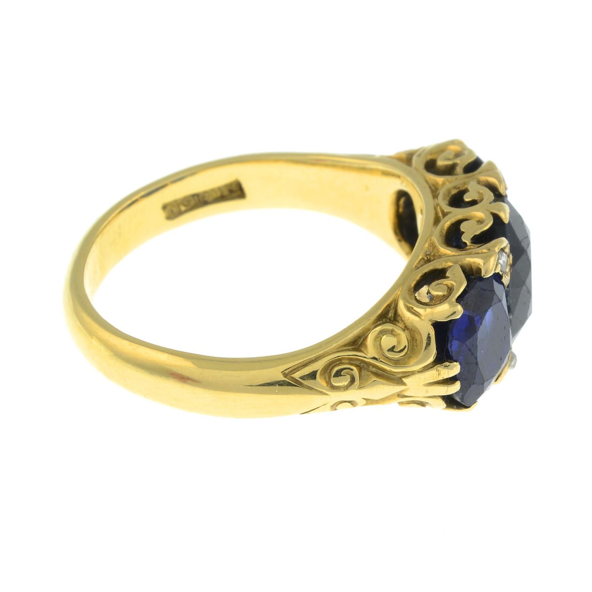 A late Victorian 18ct gold no-heat sapphire three-stone and diamond point accent ring.With report - Image 7 of 8