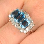 An 18ct gold aquamarine and diamond dress ring.Aquamarine calculated total weight 2.73cts,