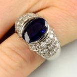 A sapphire and diamond dress ring.