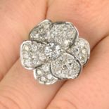 An 18ct gold diamond floral dress ring.Principal diamond estimated weight 0.35ct,