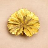 An 18ct gold naturalistic lotus leaf brooch.