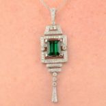 A green tourmaline and diamond geometric pendant.