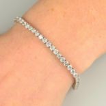 A brilliant-cut diamond line bracelet.