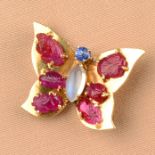 A floral carved ruby, moonstone and blue gem butterfly brooch.Length 3cms.