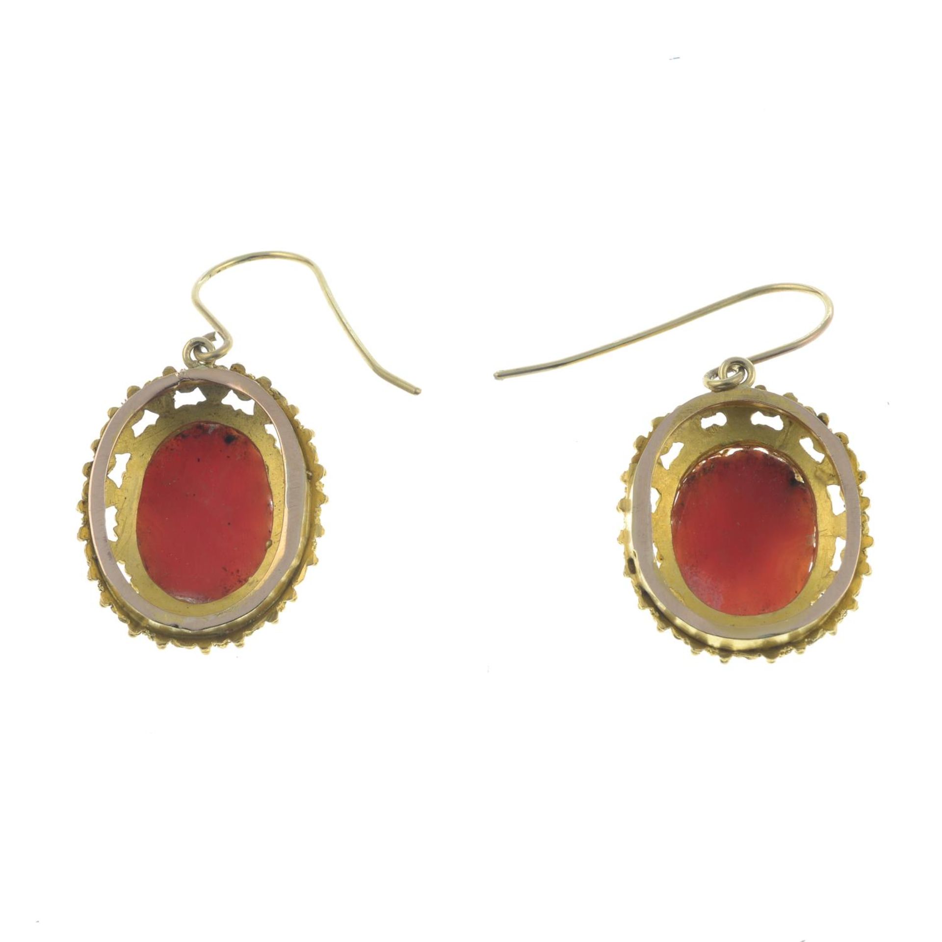 A pair of mid to late 19th century gold coral cameo earrings.Length 3.4cms. - Image 2 of 3