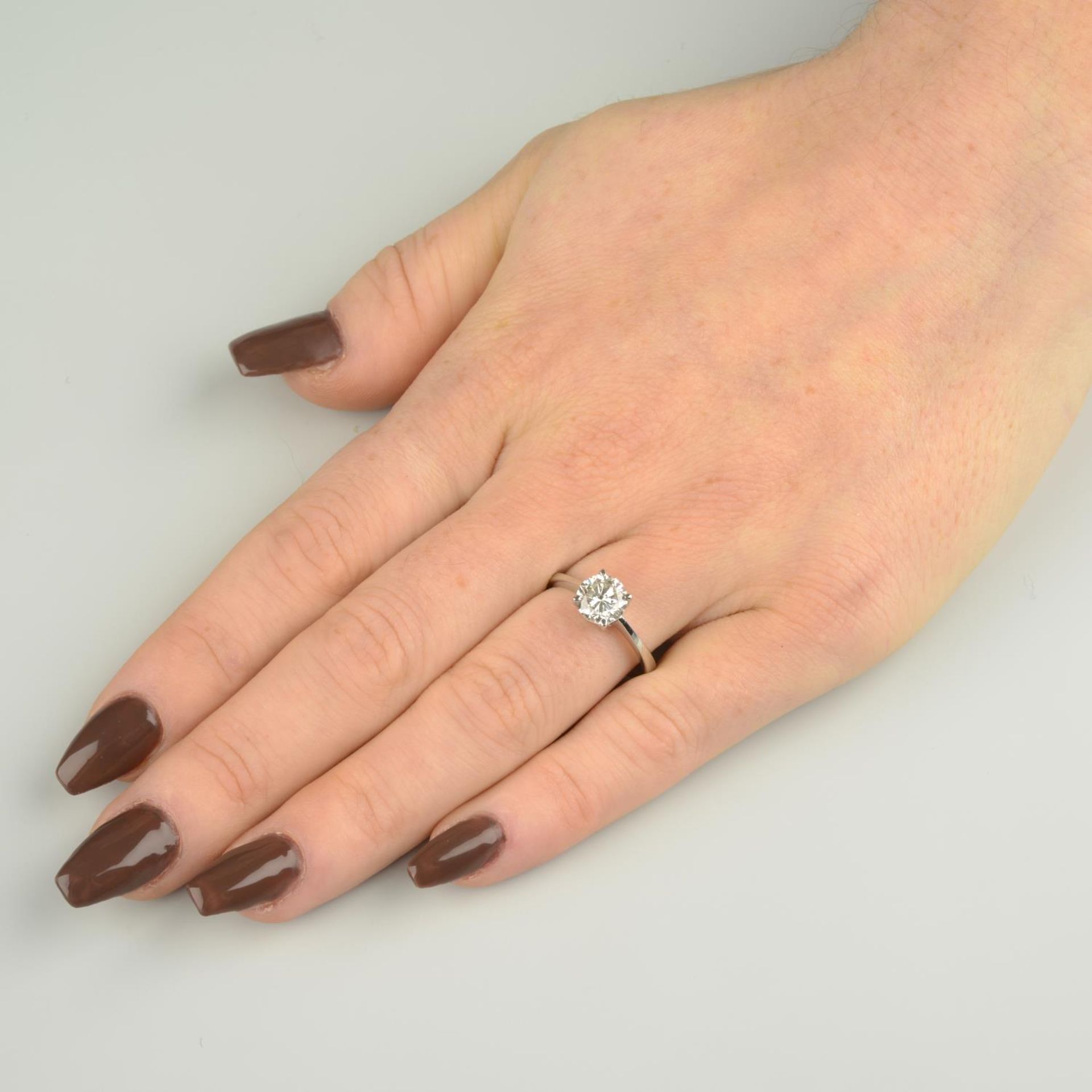 A 9ct gold brilliant-cut diamond single-stone ring. - Image 4 of 10