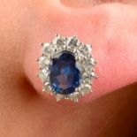 A pair of 18ct gold sapphire and brilliant-cut diamond cluster earrings.Total sapphire weight