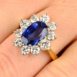 A synthetic sapphire and diamond cluster ring.