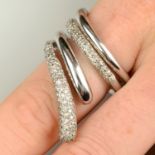 A pavé-set diamond and polished,