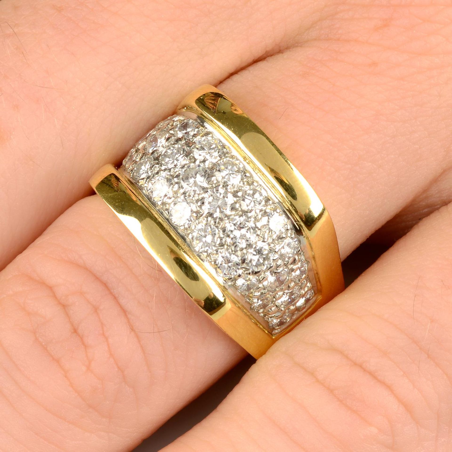 A pavé-set diamond dress ring.