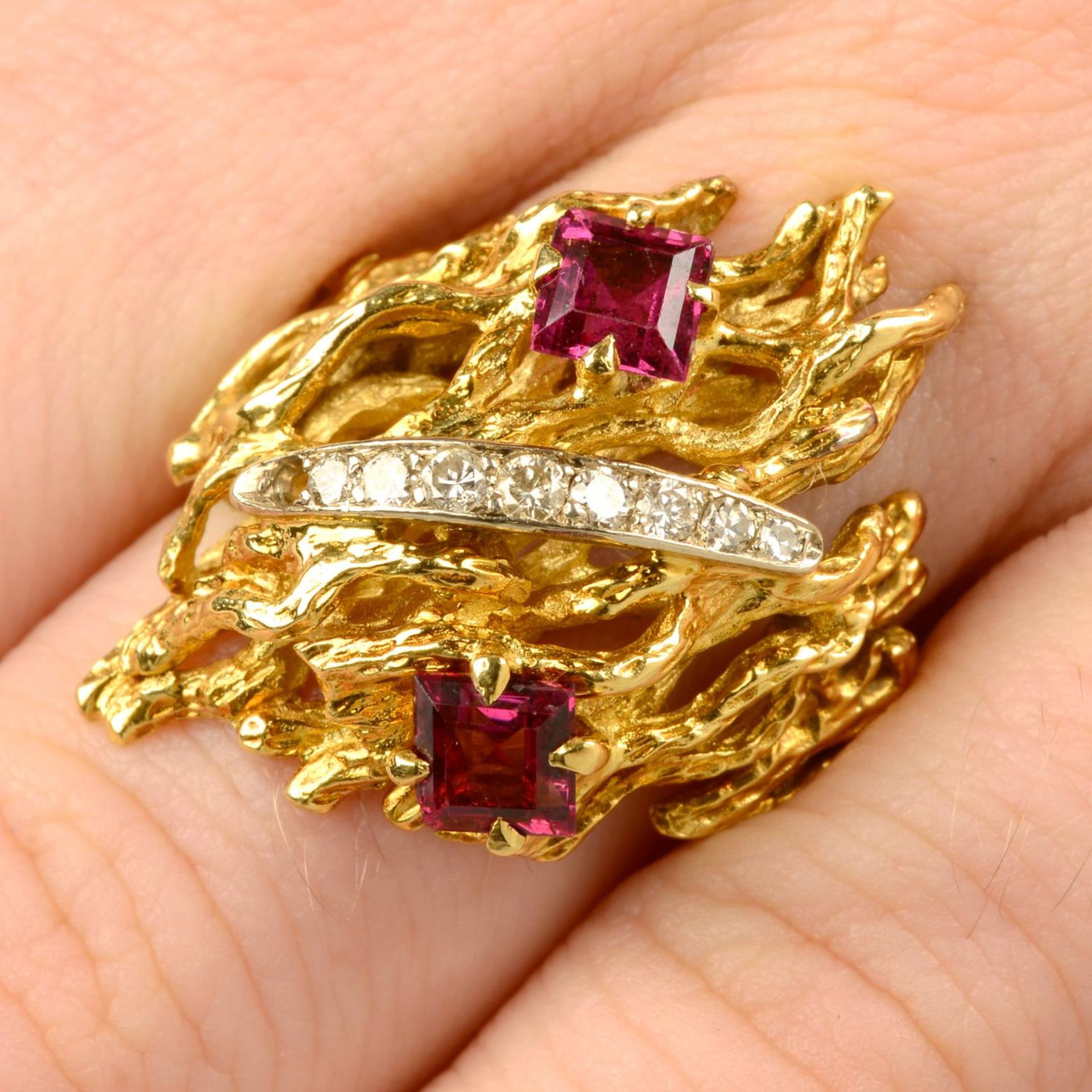 A 1970s 18ct gold garnet and diamond abstract dress ring.