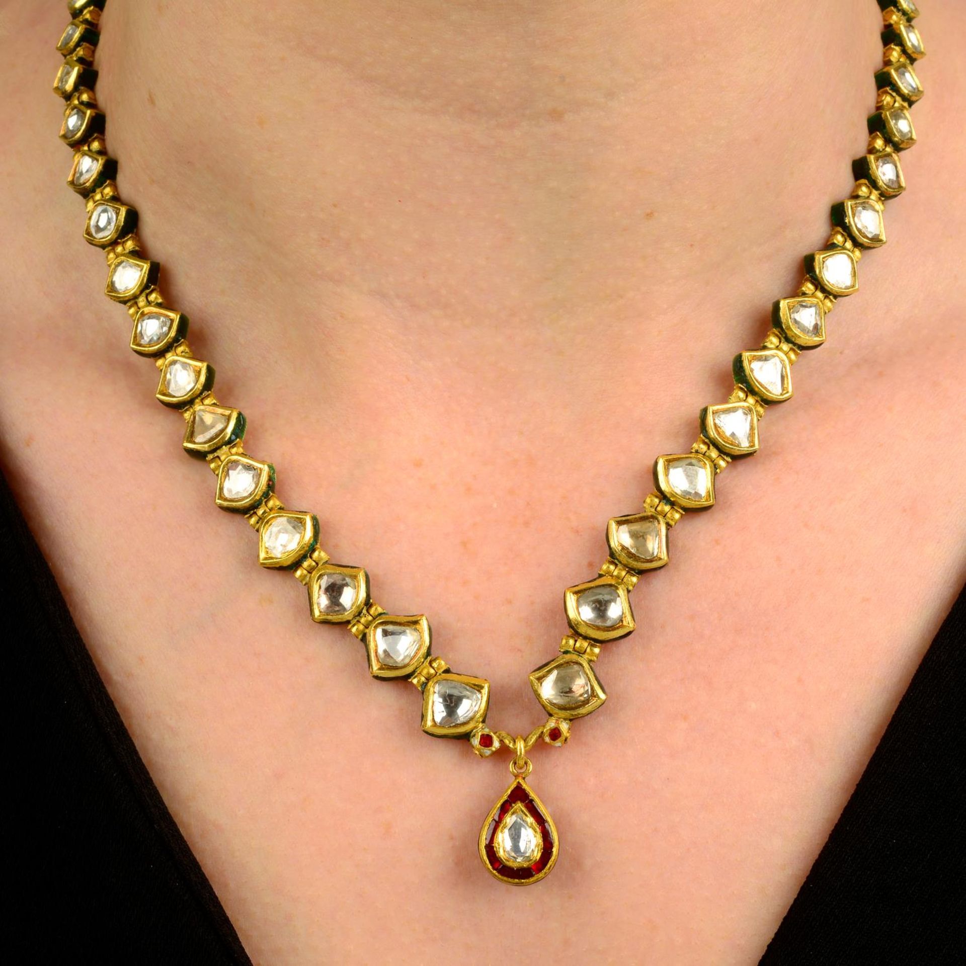 A Kundan polki diamond and enamel necklace.Length of pendant 2cms.