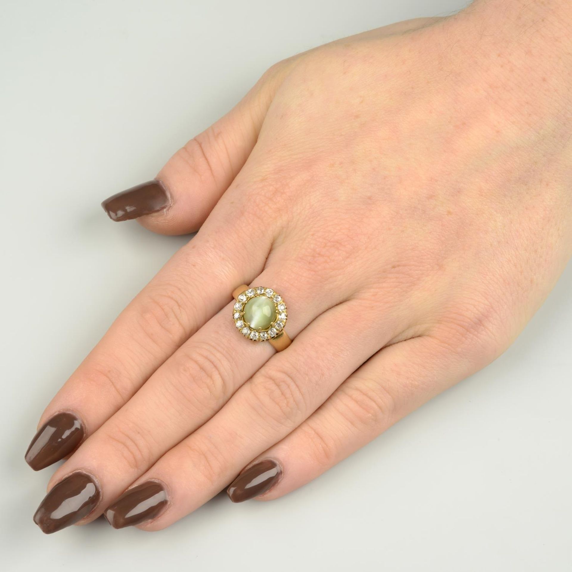 A late Victorian gold cat's-eye chrysoberyl and old-cut diamond cluster ring. - Image 4 of 7
