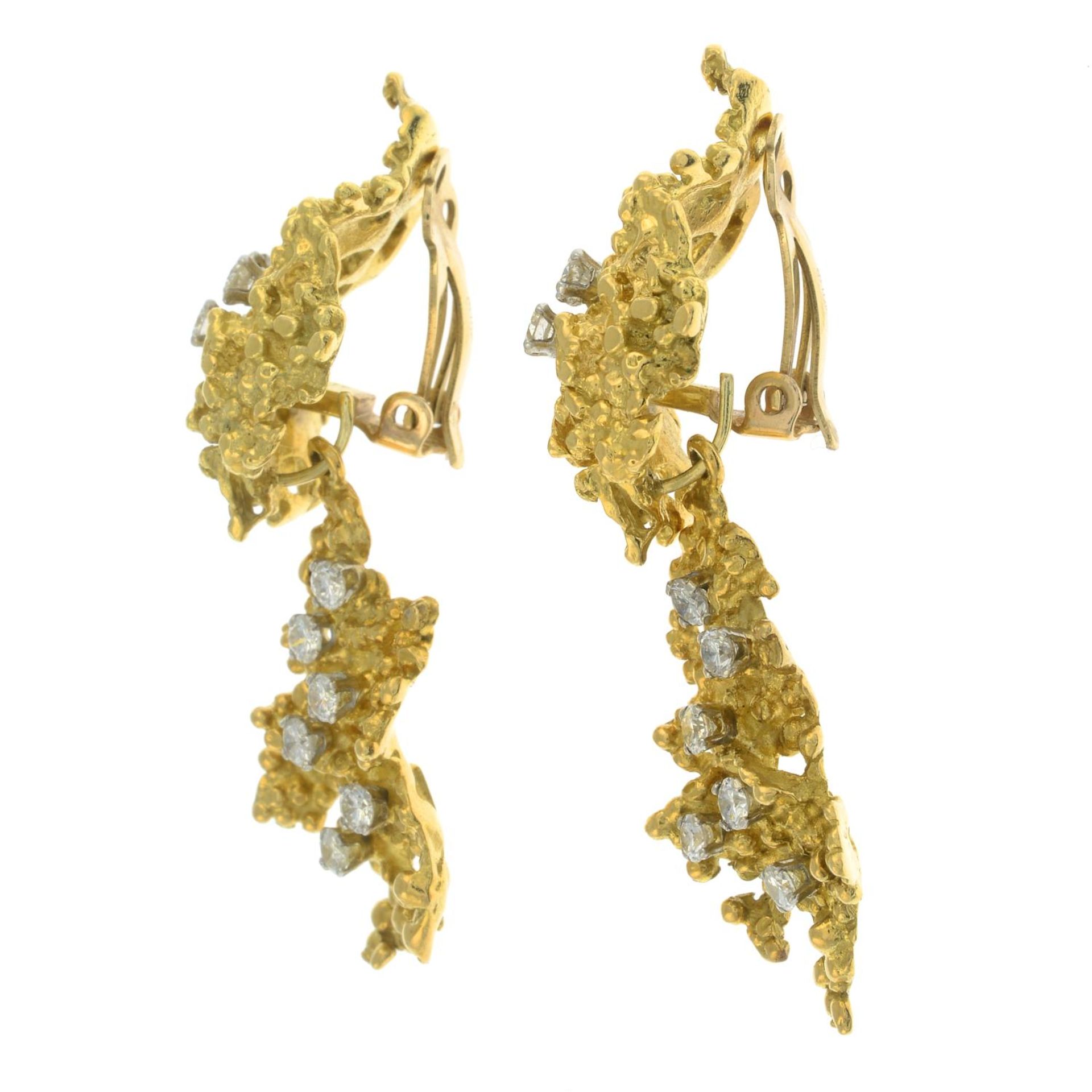 A pair of 1970's textured openwork and scattered brilliant-cut diamond earrings, - Bild 6 aus 6