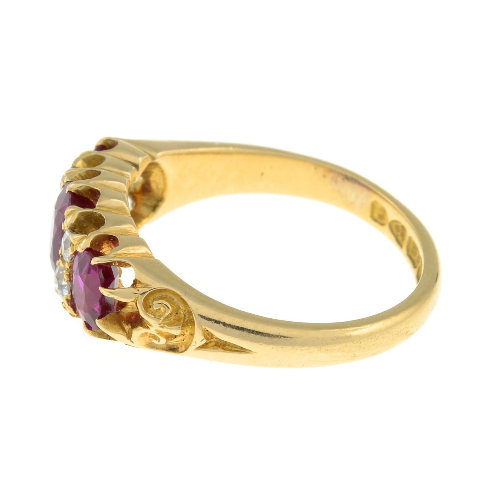 An Edwardian 18ct gold Thai ruby three-stone and diamond ring.Verbal from GCS, - Image 8 of 9