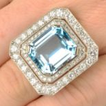 An aquamarine and diamond dress ring.