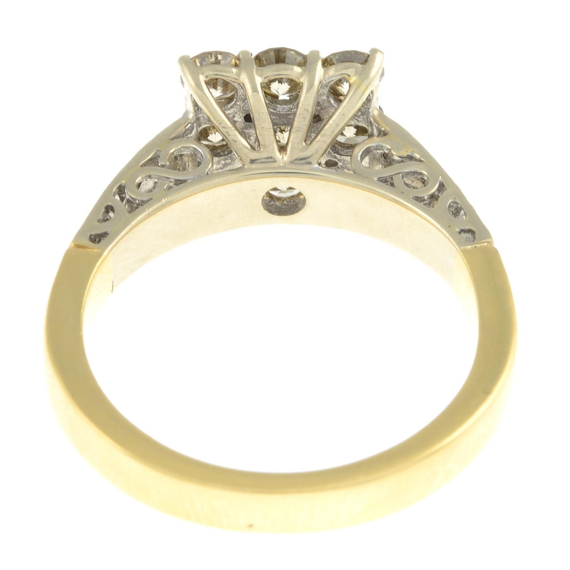 A 'brown' diamond and diamond cluster ring, with pavé-set diamond shoulders. - Image 8 of 9