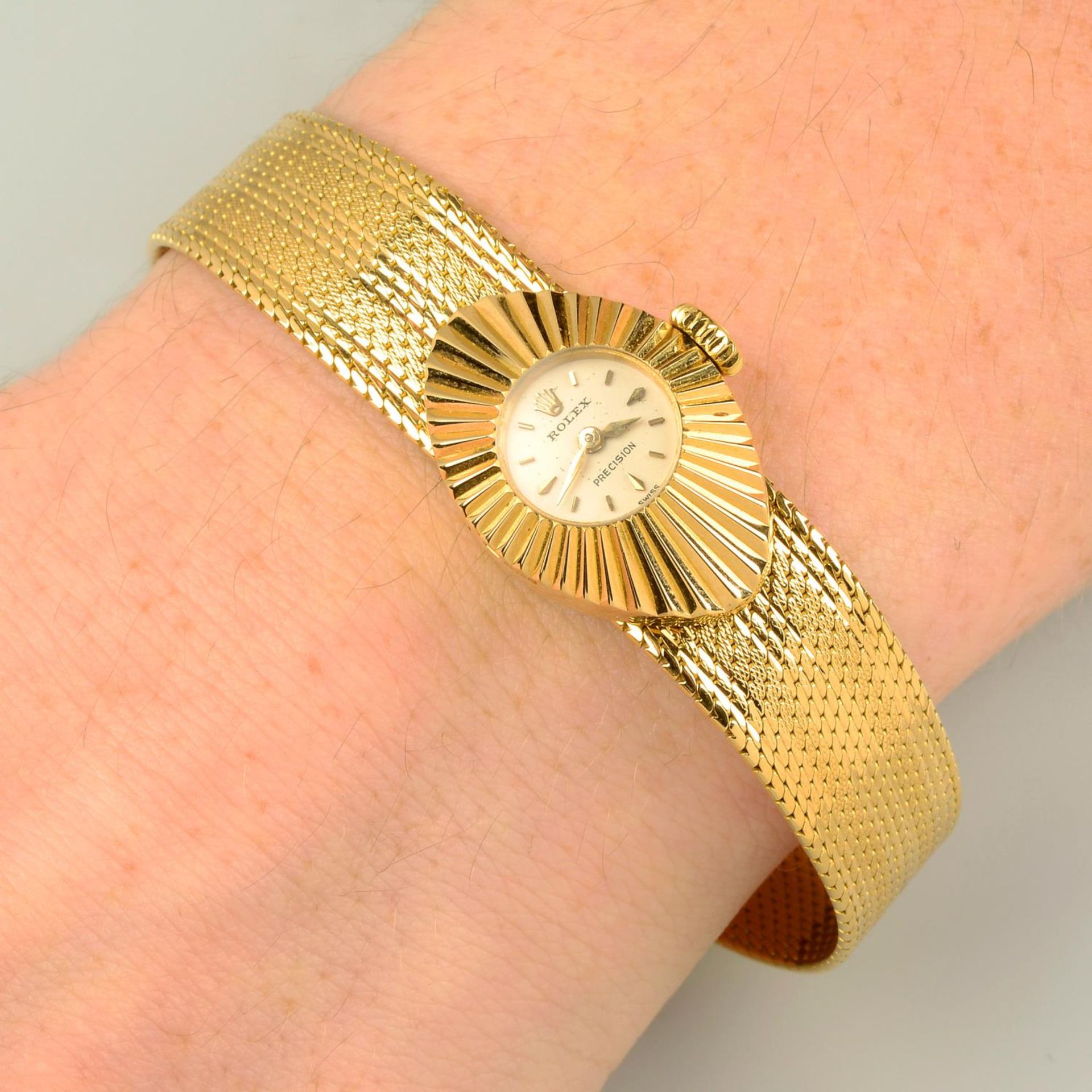 A lady's 1960s 18ct gold 'Chameleon' wristwatch, by Rolex.