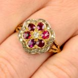 A ruby and vari-cut diamond floral cluster ring.Estimated total diamond weight 0.30ct,