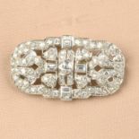 An Art Deco platinum old-cut and rectangular-shape diamond geometric brooch.Estimated total diamond