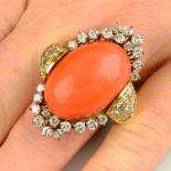 A coral and brilliant-cut diamond dress ring.Estimated dimensions of coral 24 by 17.3 by