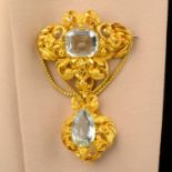 An early to mid 19th century gold aquamarine brooch.Aquamarine total weight 21cts.Length 8cms.