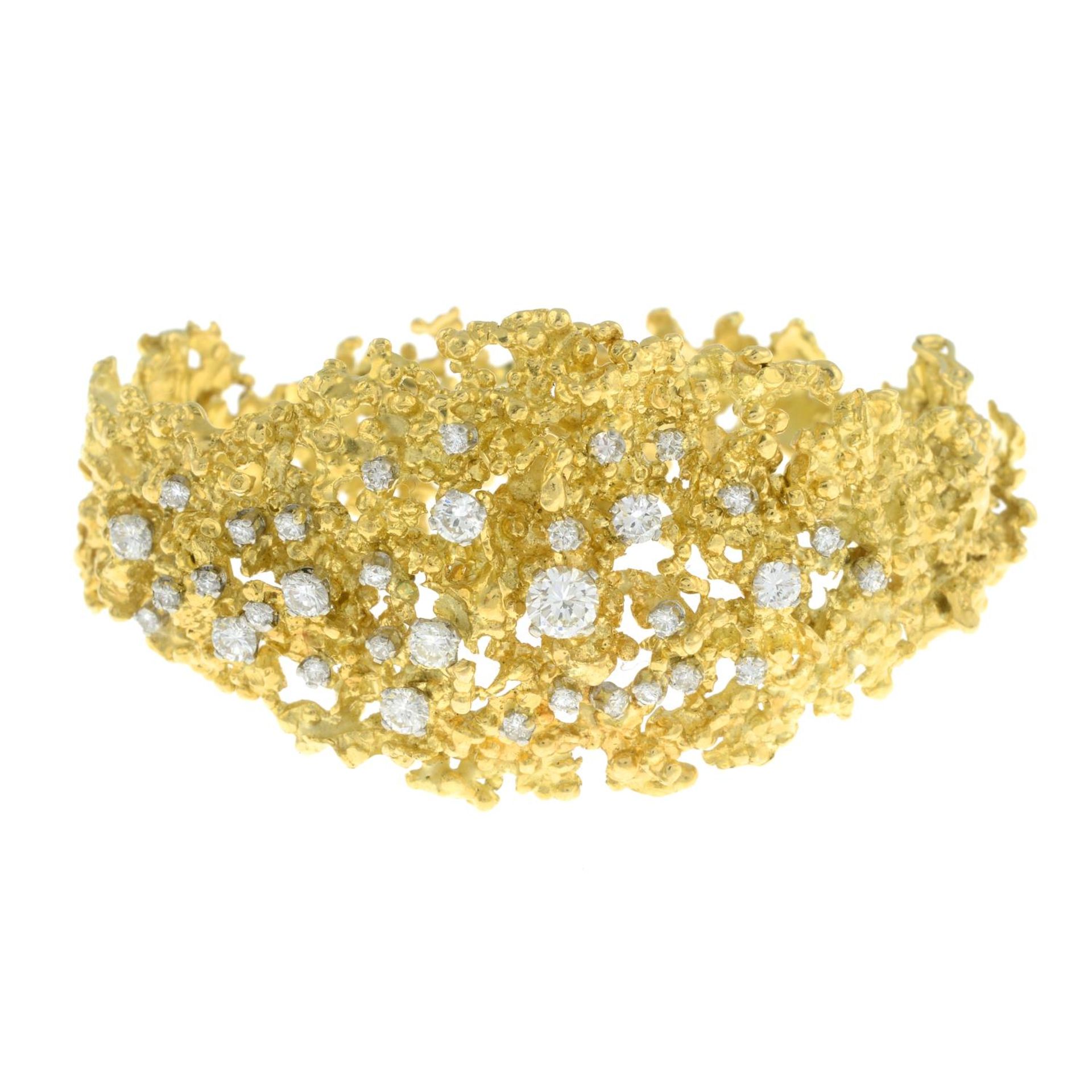 A 1970's textured openwork 18ct gold and scattered brilliant-cut diamond hinged bangle, - Image 3 of 7