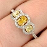 A 'yellow' diamond and diamond triple cluster ring.Total diamond weight 1.01cts,