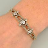 An early 20th century platinum and 18ct gold old and rose-cut diamond bracelet.Estimated total