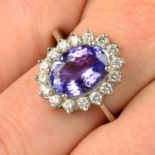 A tanzanite and brilliant-cut diamond cluster ring.Tanzanite calculated weight 3.40cts,