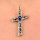 An early 20th century platinum and gold synthetic sapphire and rose-cut diamond cross pendant.