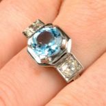 An aquamarine and old-cut diamond three-stone ring.