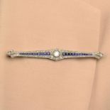 An early 20th century synthetic sapphire and diamond bar brooch.Principal diamond estimated weight