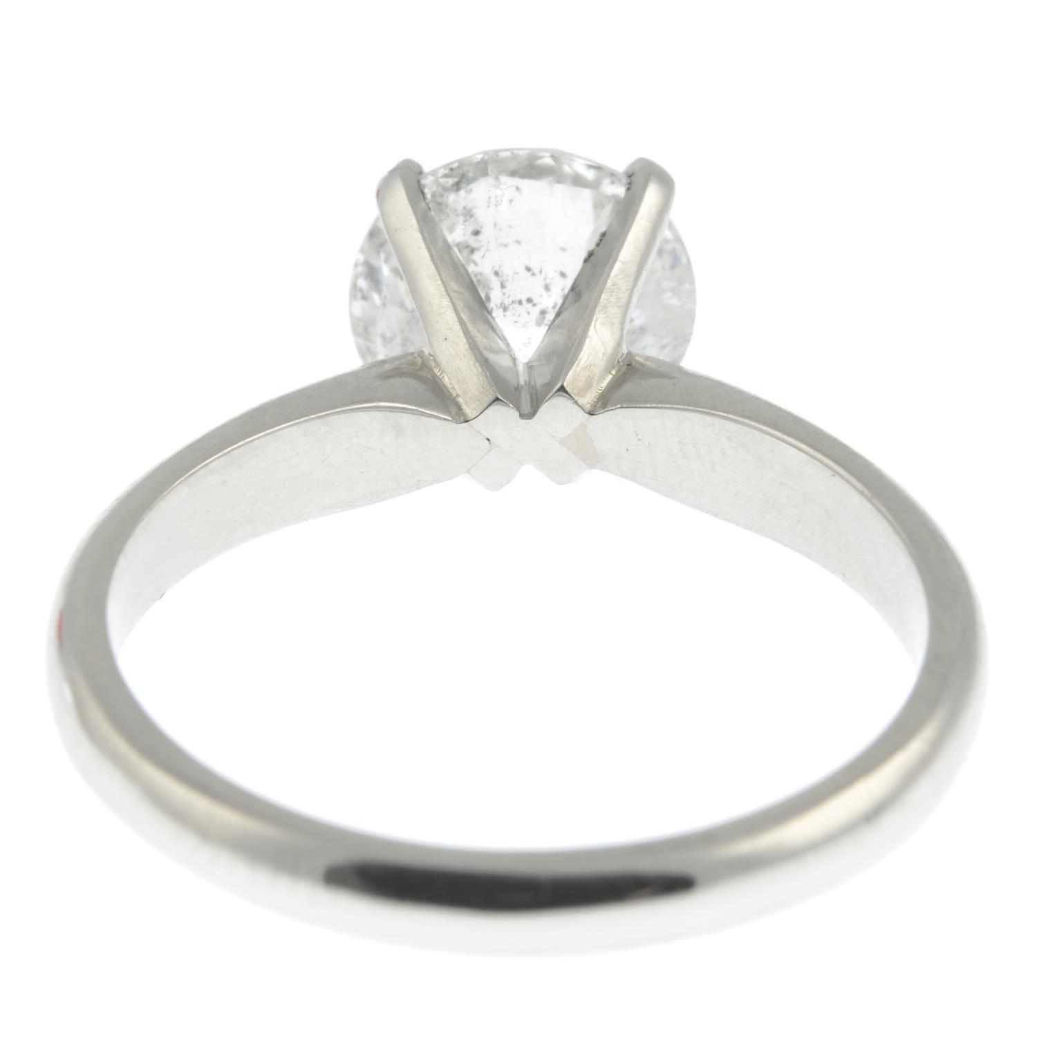 A platinum brilliant-cut diamond single-stone ring. - Image 7 of 9