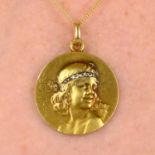A French Art Nouveau gold medallion pendant,