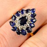 A sapphire and diamond pear-shape cluster ring.