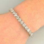 An 18ct gold brilliant-cut diamond line bracelet.