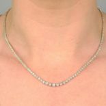 A brilliant-cut diamond line necklace.