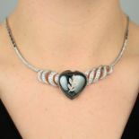 A hematite and diamond heart necklace.