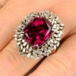 A rhodolite garnet and vari-cut diamond cluster ring.