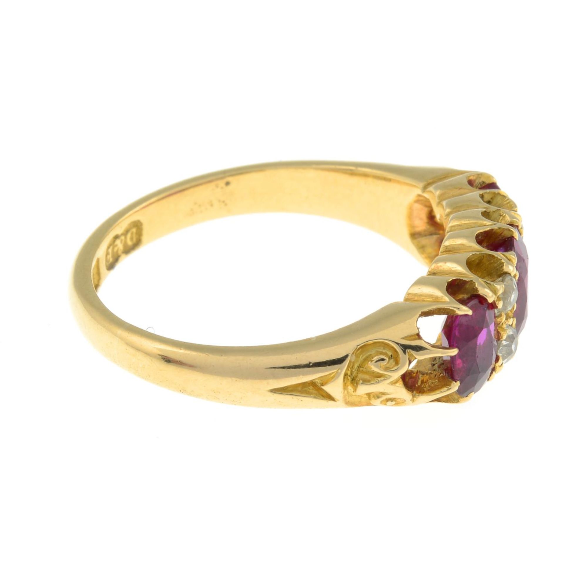 An Edwardian 18ct gold Thai ruby three-stone and diamond ring.Verbal from GCS, - Image 9 of 9