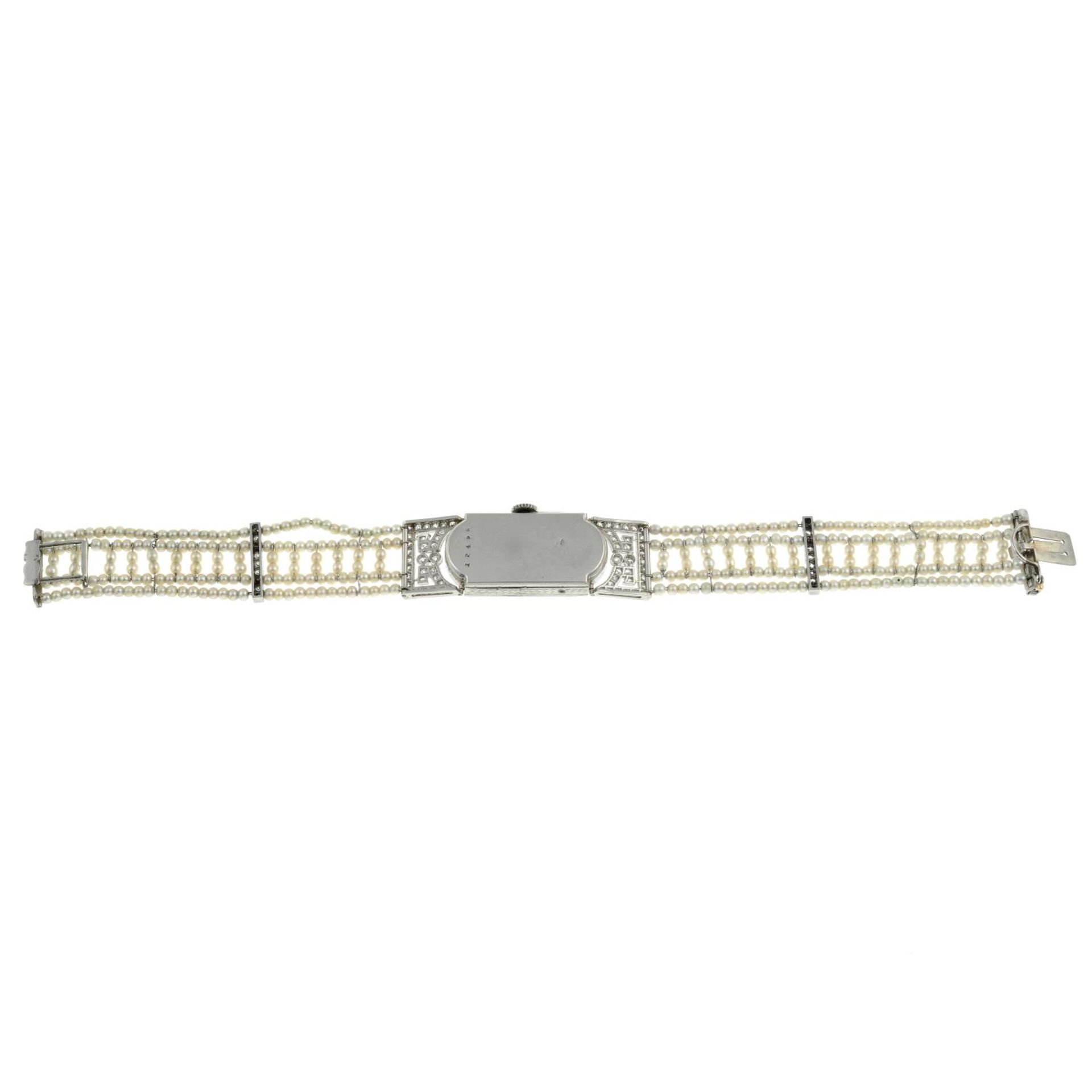 A lady's Art Deco platinum and 18ct gold diamond wristwatch, with seed pearl and diamond strap. - Bild 6 aus 7