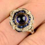 A sapphire cabochon and calibré-cut sapphire and diamond dress ring.Sapphire cabochon calculated