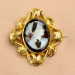 A late 19th century 18ct gold sardonyx cameo brooch.Length 4.3cms.